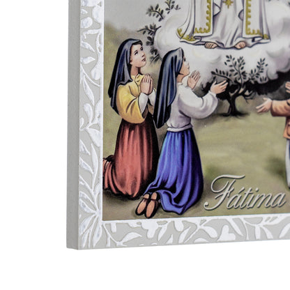 Quadro Madonna di Fatima in legno e cornice in foglia argento. Dimensioni 9x13,5 cm