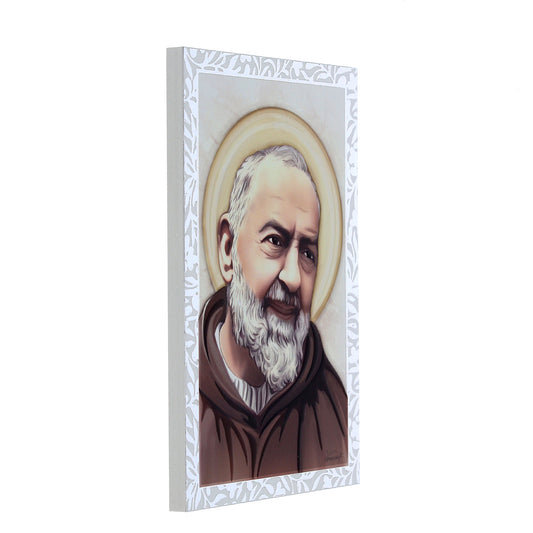 Quadro San Pio in legno e cornice in foglia argento. Dimensioni 9x13,5 cm
