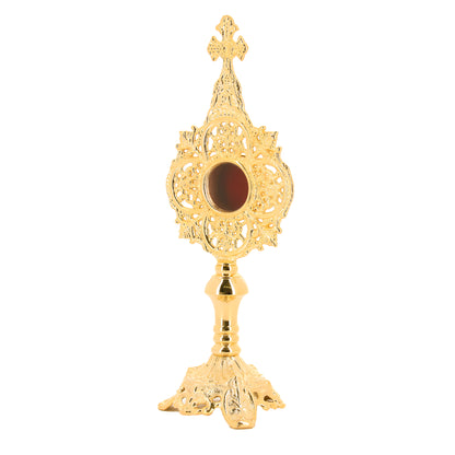 Reliquiario in ottone dorato. Altezza 34 cm