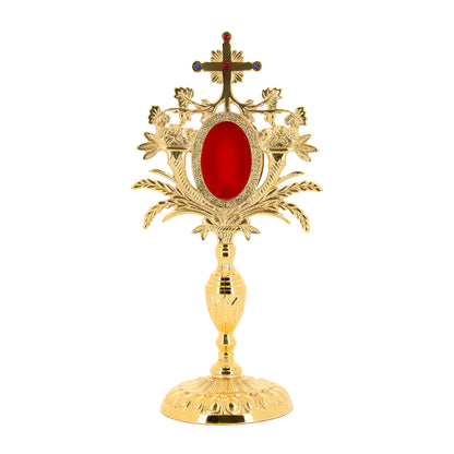 Reliquiario in ottone dorato con pietre. Altezza 33 cm