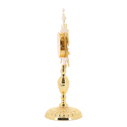 Reliquiario in ottone dorato con pietre. Altezza 33 cm