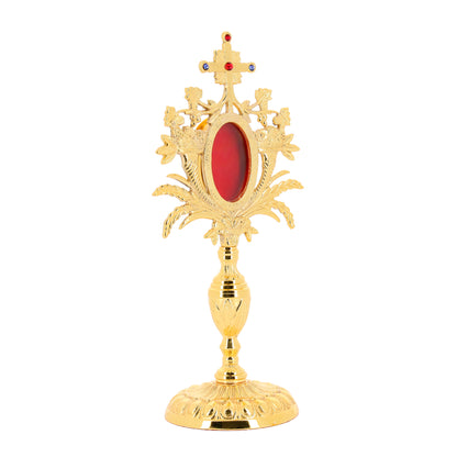 Reliquiario in ottone dorato con pietre. Altezza 33 cm