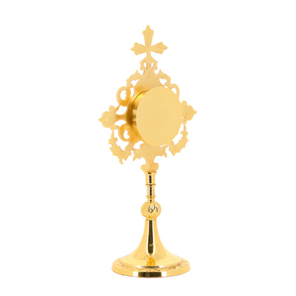 Reliquiario in ottone dorato. Altezza 34 cm