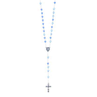 Rosario con grani a cuore 6 mm celeste trasparente