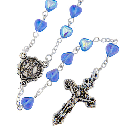 Rosario con grani a cuore 6 mm celeste trasparente