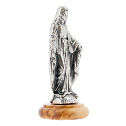 Statua Madonna Miracolosa in metallo argentato e base in legno d'ulivo. Altezza 6,5 cm
