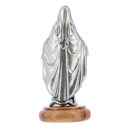 Statua Madonna Miracolosa in metallo argentato e base in legno d'ulivo. Altezza 6,5 cm
