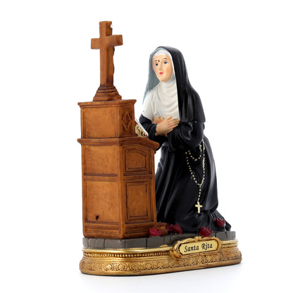 Statua Santa Rita inginocchiata in resina. Altezza 17 cm
