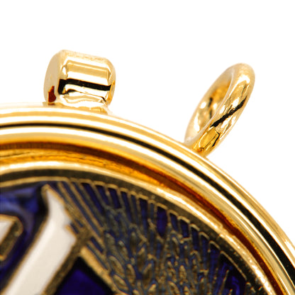 Teca con placca smaltata raffigurante IHS e spighe. Diametro 5,4 cm